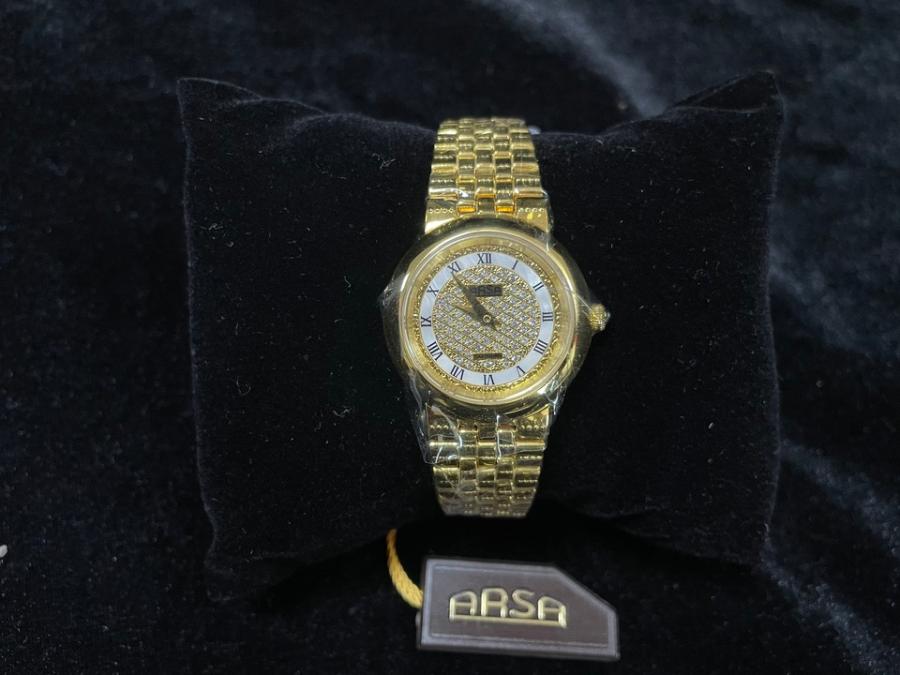 手表金黄色金属表链 金黄色金属表盘 表盘印有ARSA字样网络拍卖公告