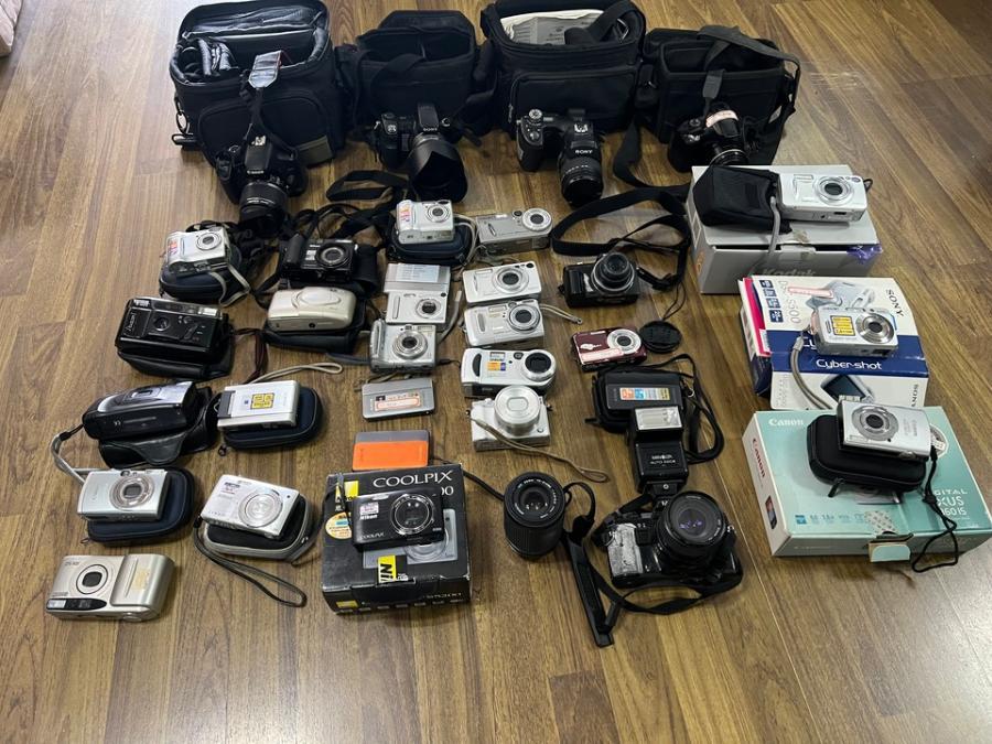 废旧照相机32台网络拍卖公告